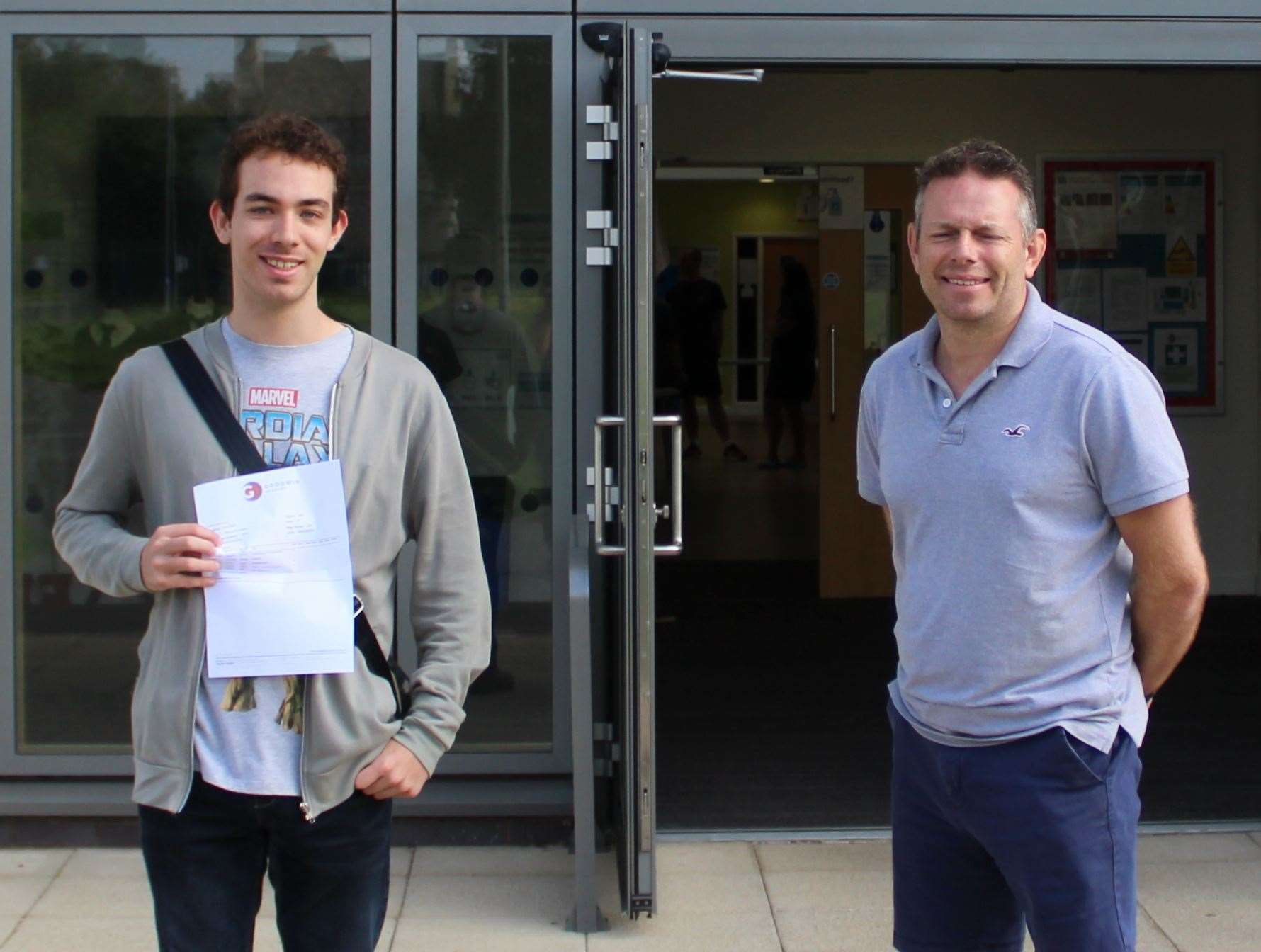 Student Jake Larkins with principal Simon Smith. Picture: Goodwin Academy