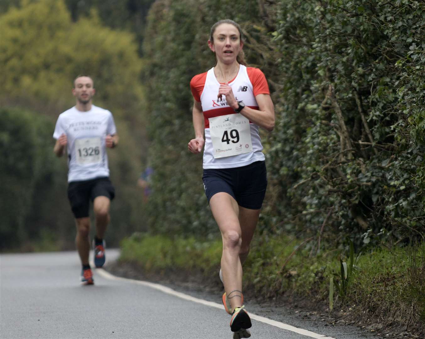 Ladies' winner Chelsea Baker of Bristol & West AC enters Bridge Village. Picture: Barry Goodwin (62013938)