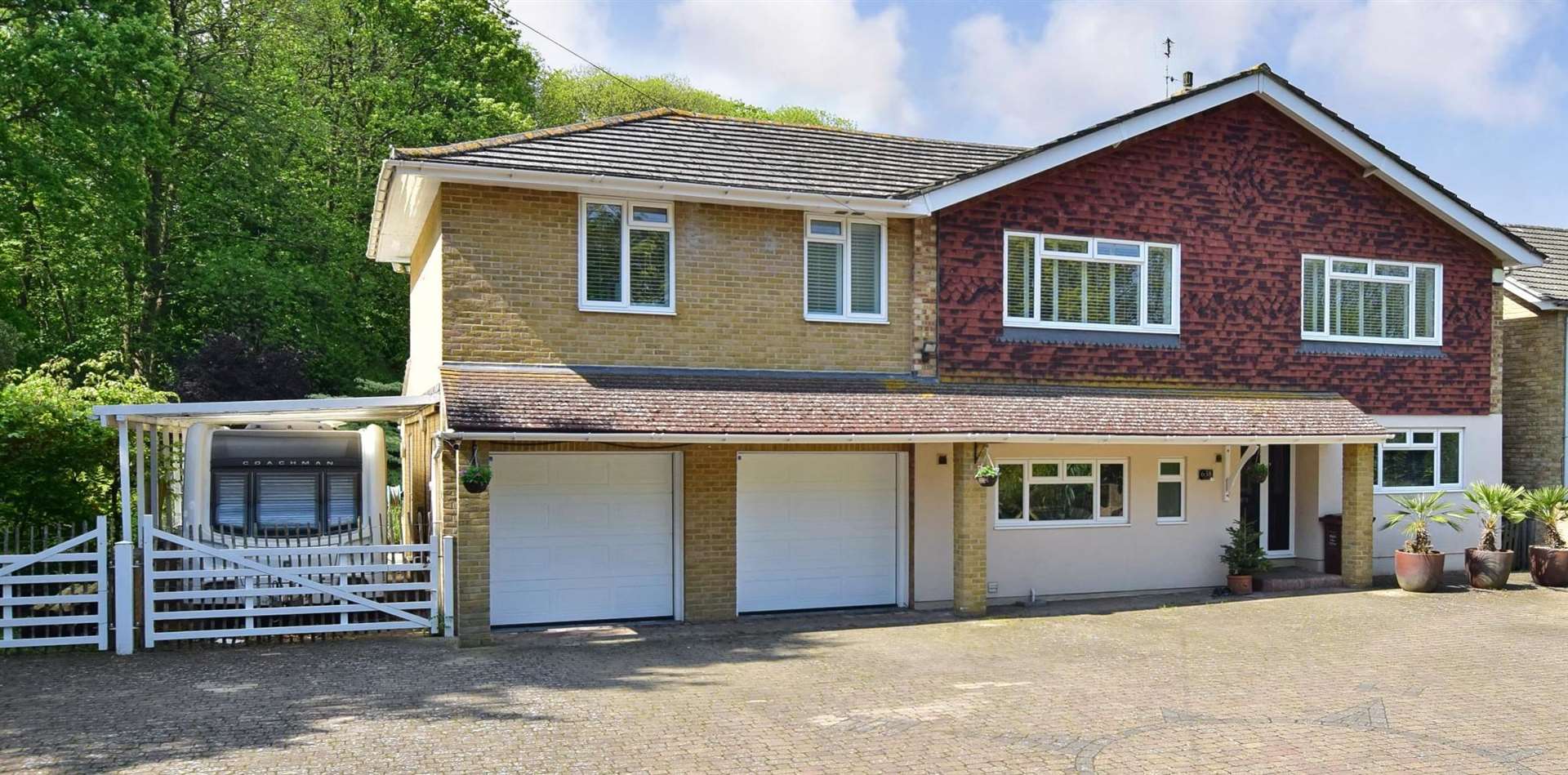 There's a large gated driveway at the house for sale at Mierscourt Road