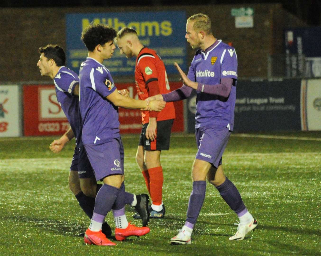 Charlie Seaman is congratulated by Scott Rendell after scoring Maidstone's first goal at Eastbourne Picture: Steve Terrell