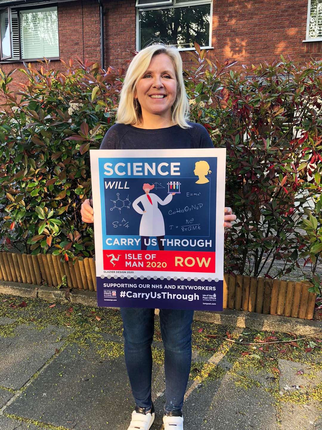 Dr Lucy Hawking with the science stamp (Isle of Man Post Office)