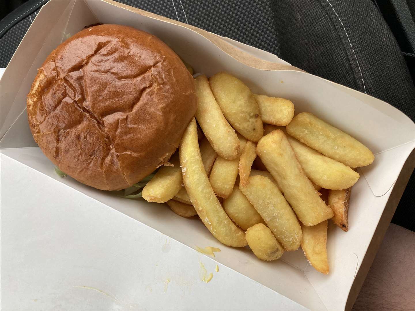 My gourmet burger and chip nestled in its cardboard home