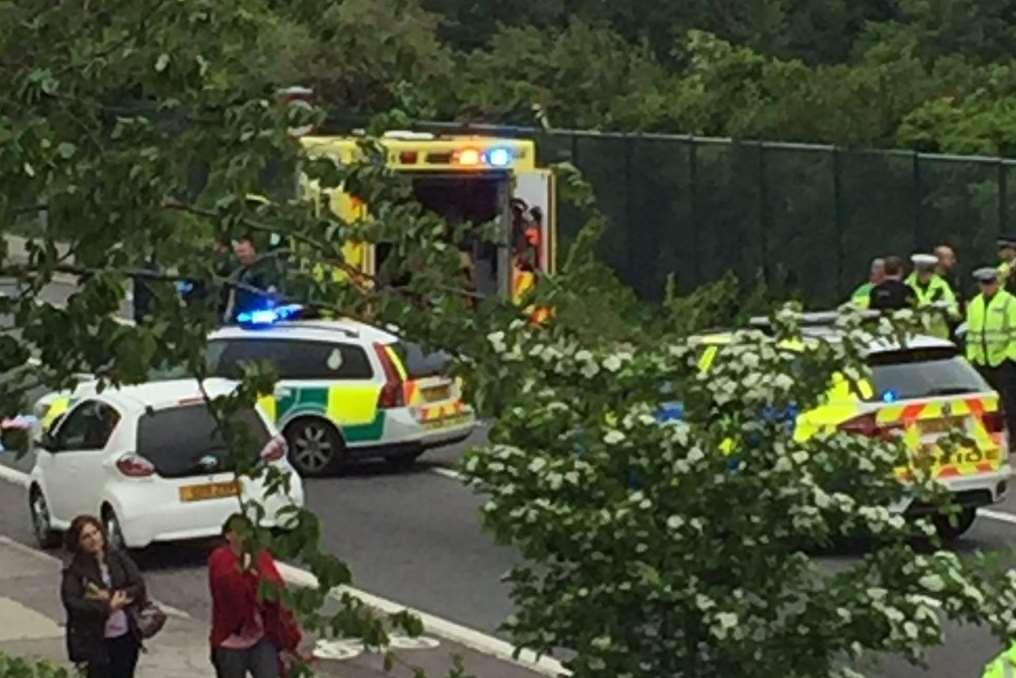 Police and ambulance crews on London Road, Northfleet, after an 88-year-old woman was hit by a car and died