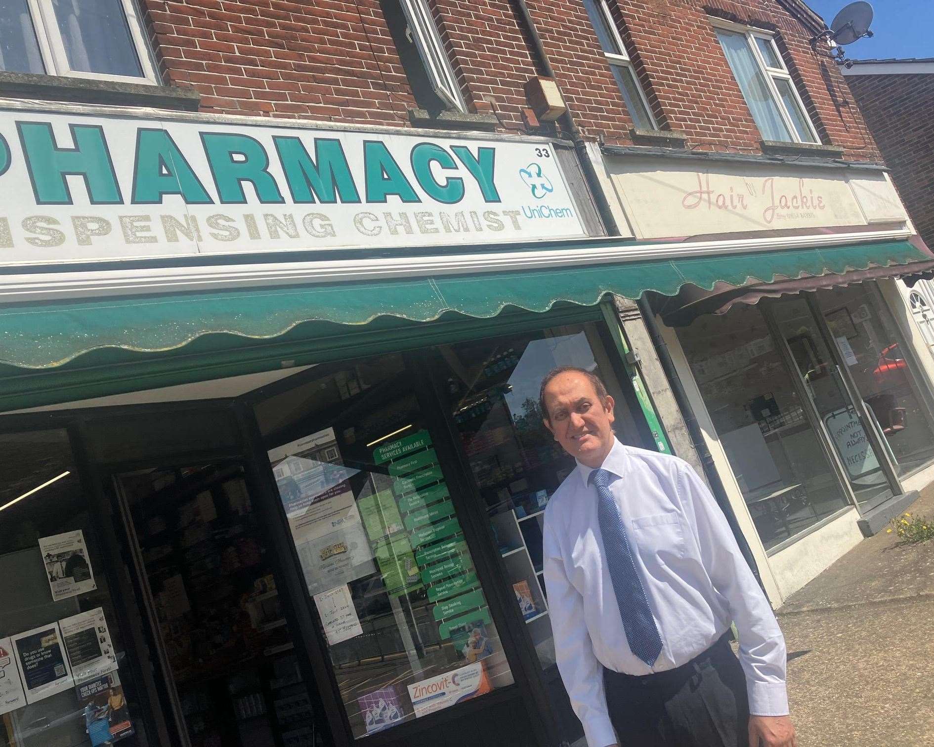 Ferride Karson outside one of his two pharmacy shops in Medway