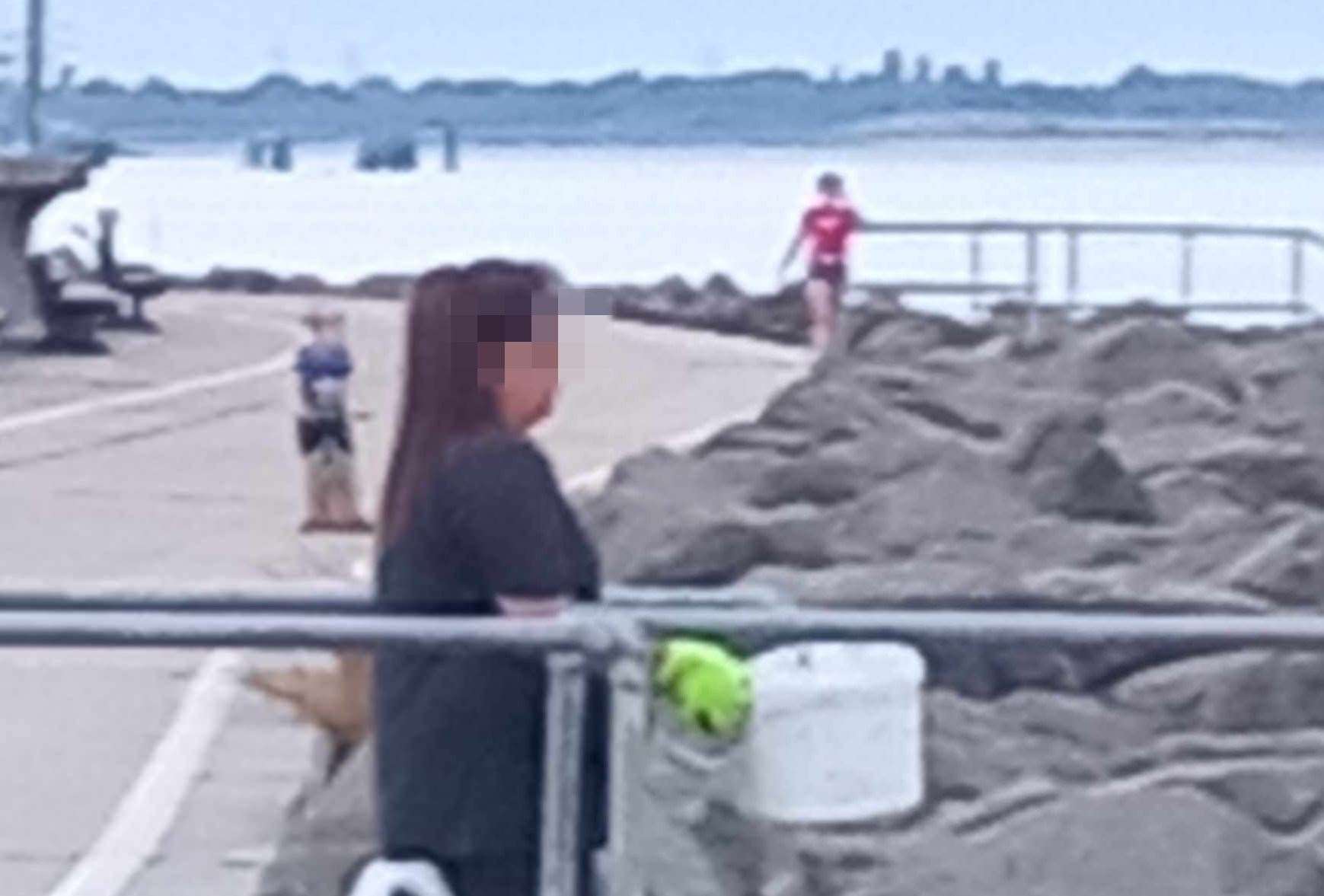 A suspected cockle-picker with a bucket at Minster. Picture: Mandy Yates