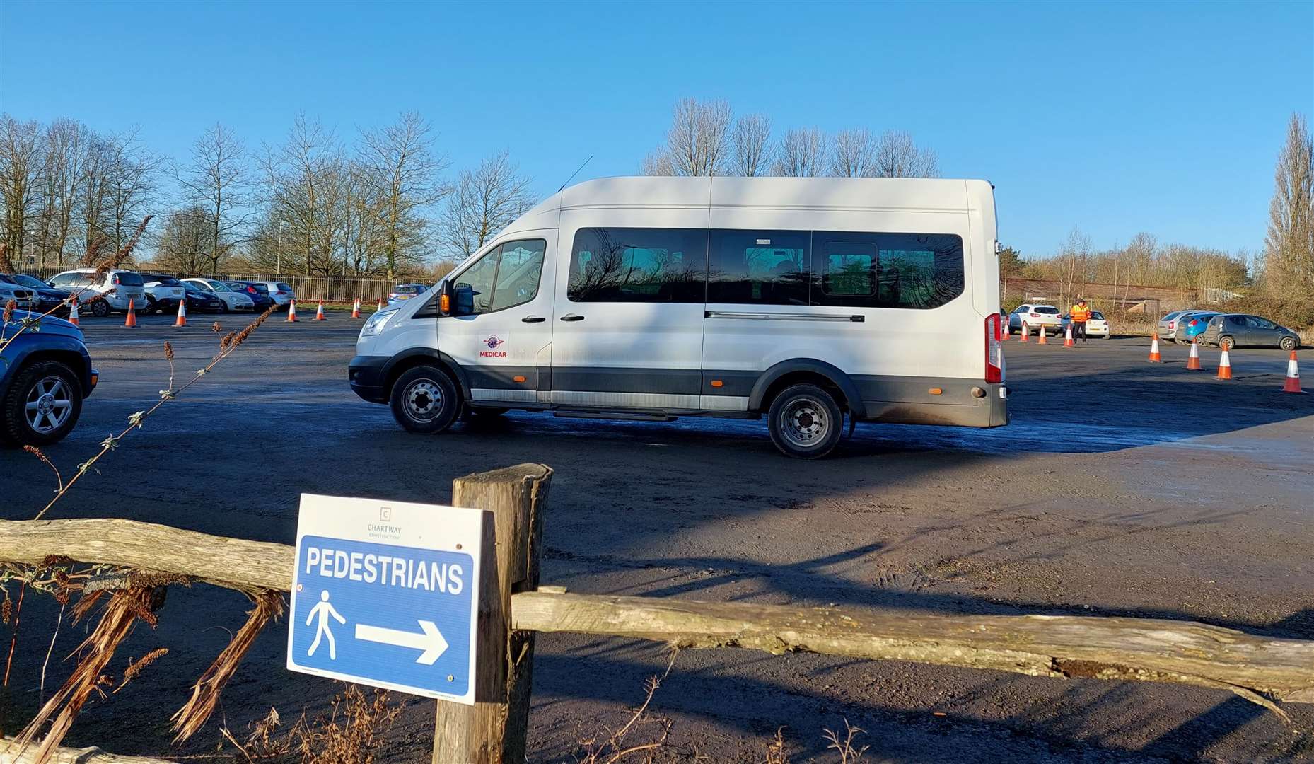 Hospital workers are taken to and from the Harvey on minibuses