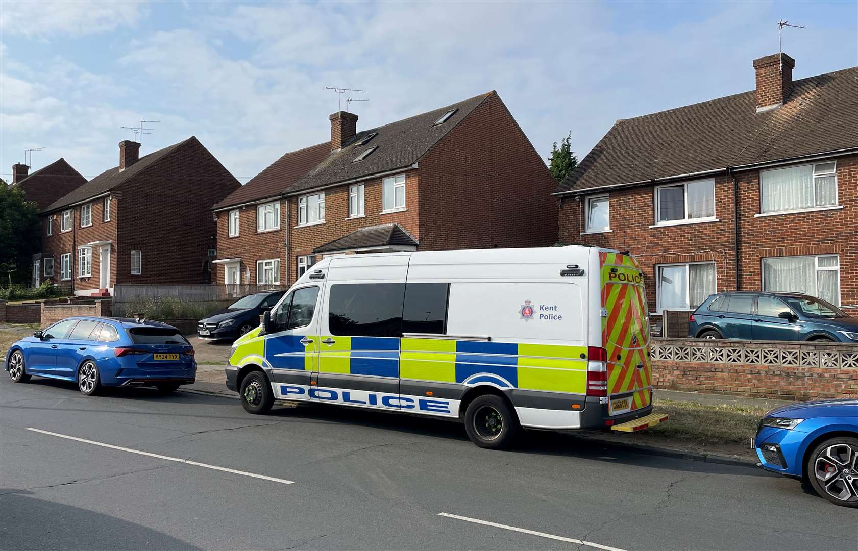 Police at the scene as Henderson Drive, Dartford, was cordoned off while murder investigations took place