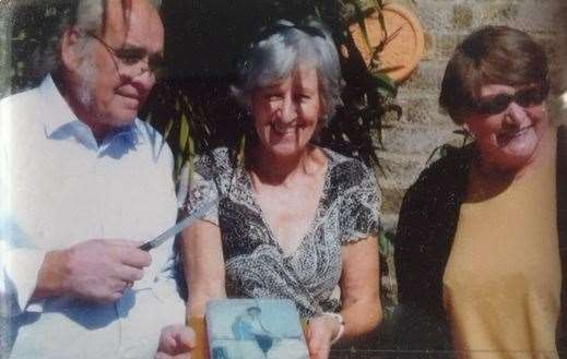 The three siblings at Mr Whisker's 65th birthday party; Vie Millard is in the centre