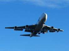 An aeroplane lands at Kent International Airport, Manston