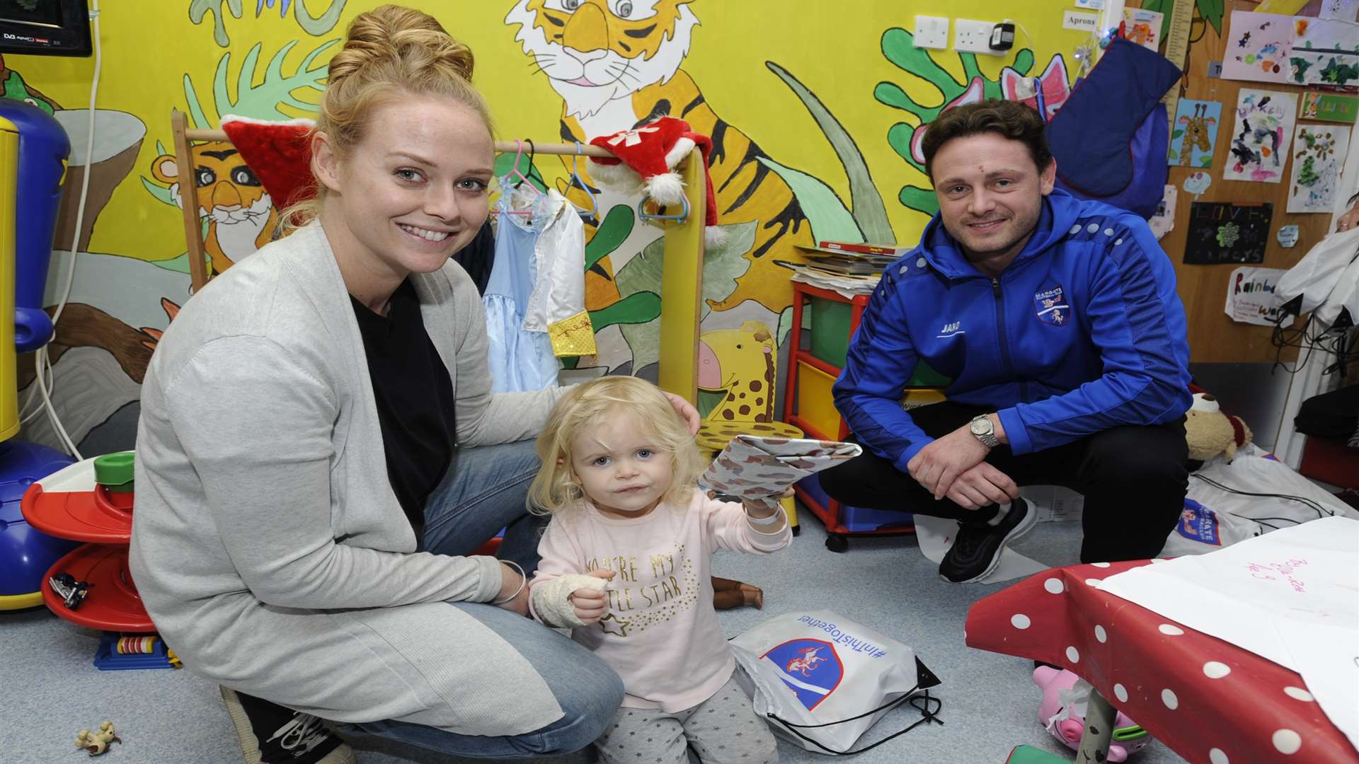 Margate striker Frannie Collin with a young patient