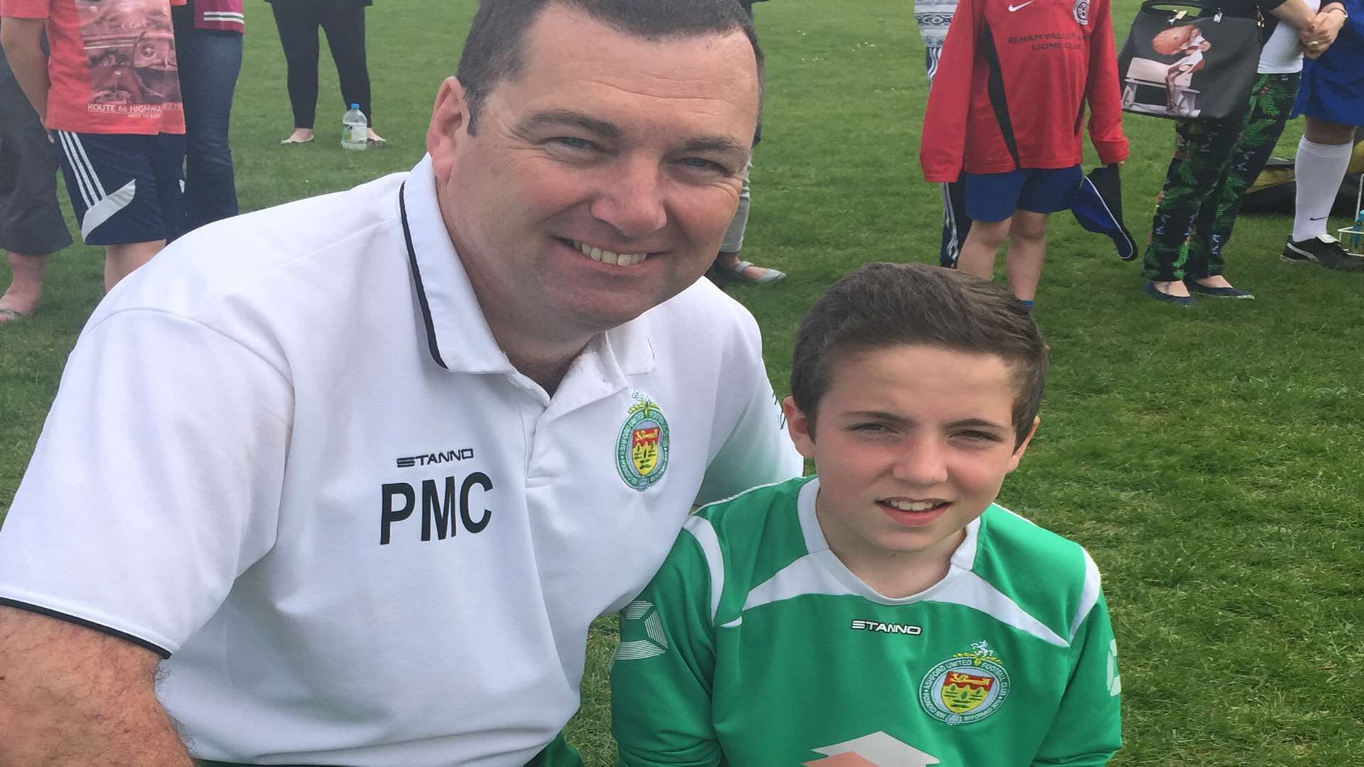 Dad Paul and son Declan celebrate with the trophy which they have dedicated in Connor's memory