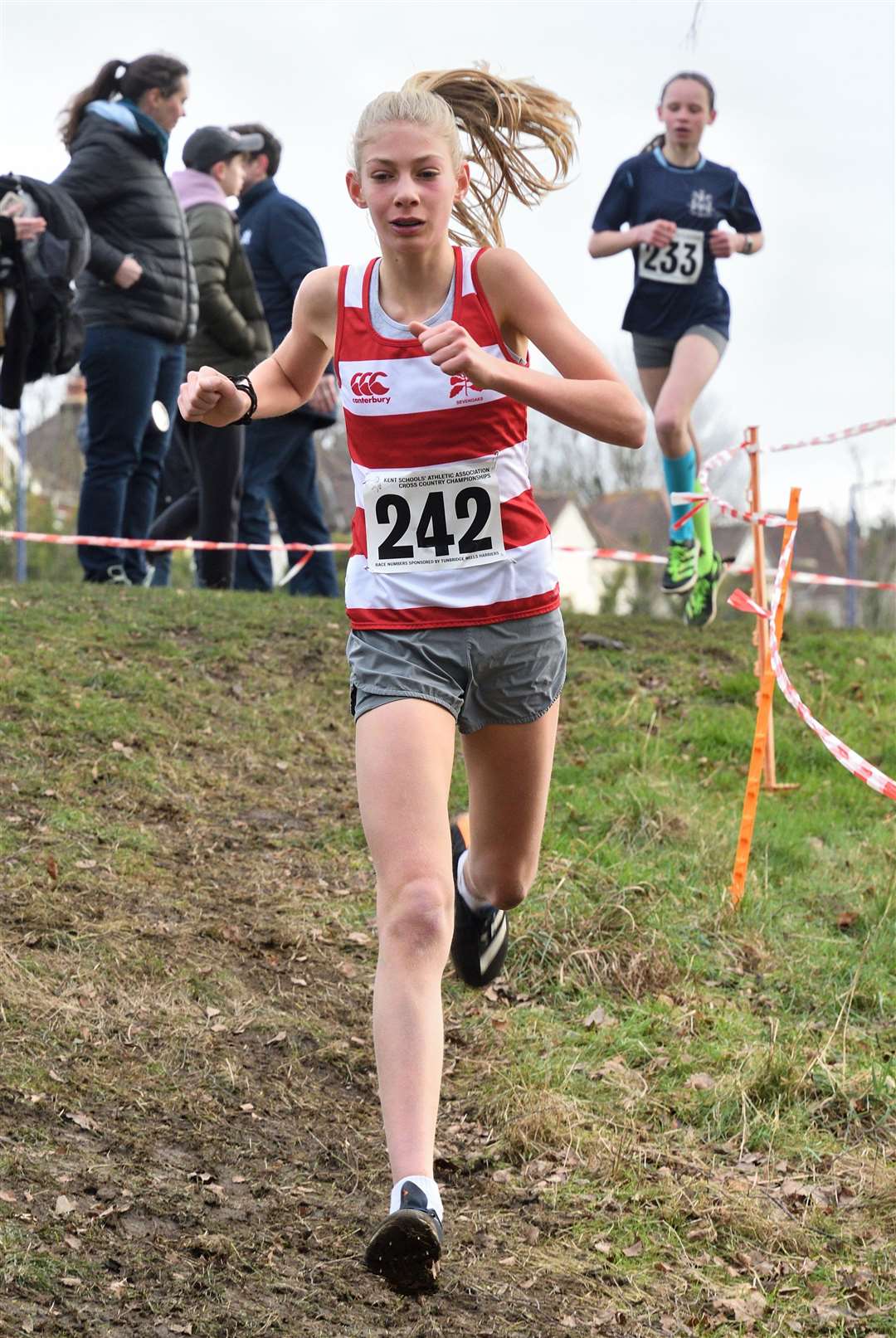 Alice Keen of Sevenoaks (No.242) taking on her junior girls rivals. Picture: Simon Hildrew