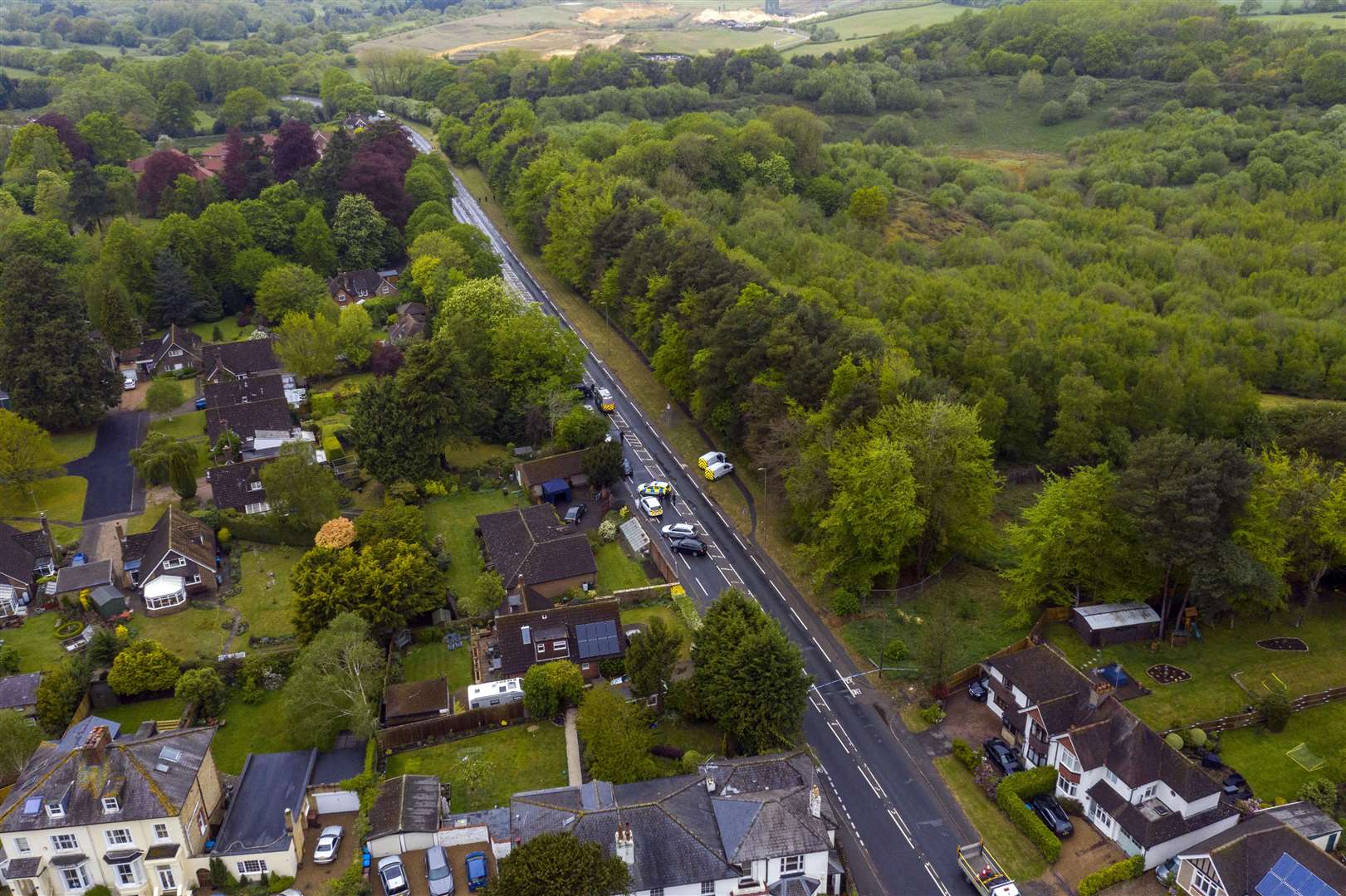 An aerial view of Surrey Police on the A25 Bletchingley Road, Godstone, near Reigate, after an 88-year-old man was found dead in a home (Steve Parsons/PA)