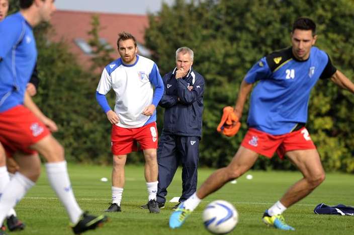 Peter Taylor watches over his squad in training last season Picture: Barry Goodwin