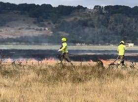 Fire crews are dealing with the blaze between Dymchurch and Hythe. Picture: Stuart Jaenicke