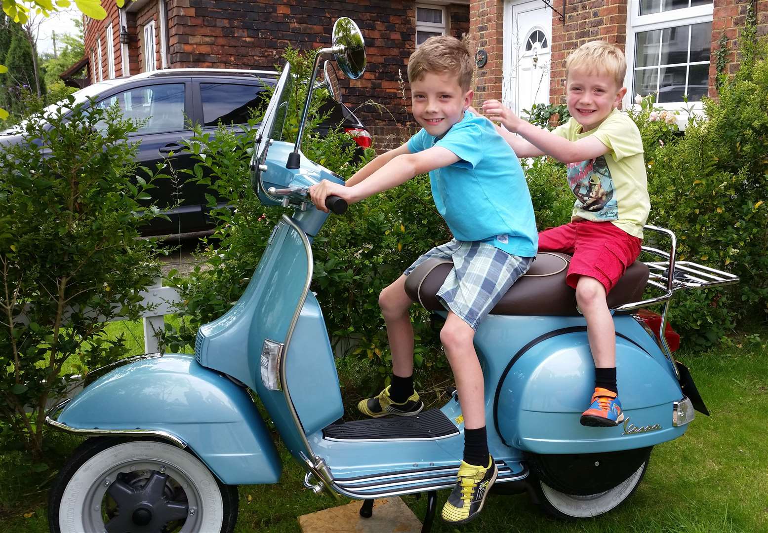 Warren's children Freddie and Albert pictured on his Vespa. Picture: Warren Porritt/KSS