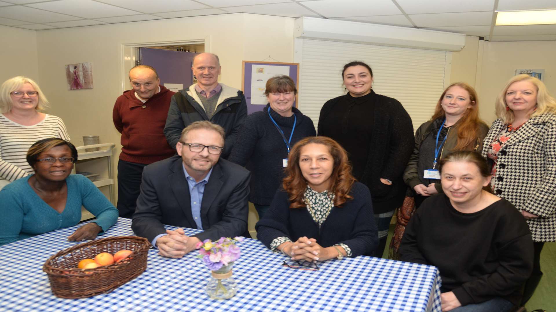 Andy James and Helen Grant with volunteers at the day centre