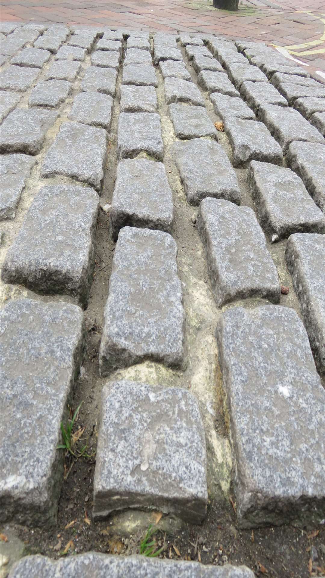 Photographer Andy Clark fears the cobbles are dangerous for wheelchair users, the elderly, and for high heeled shoes.