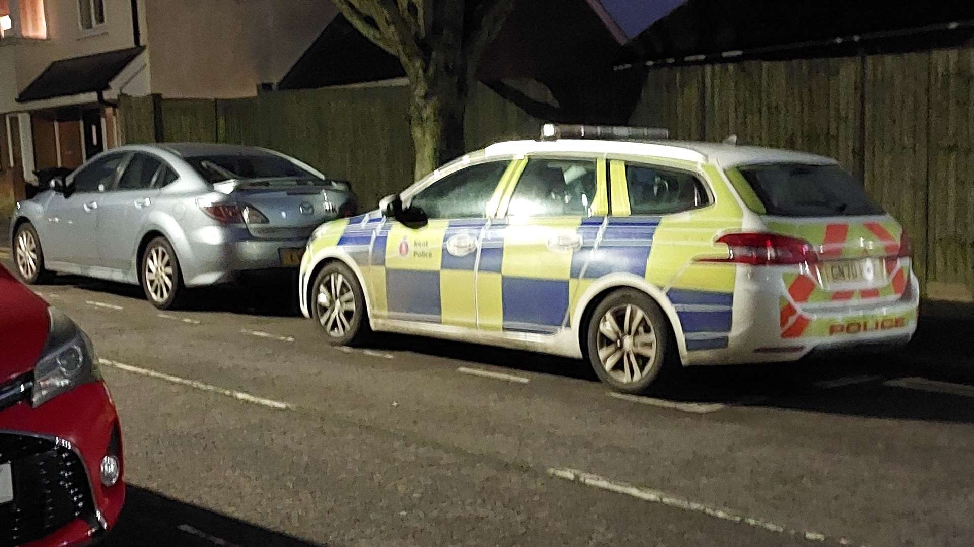 Police remain in Godinton Road following the raid