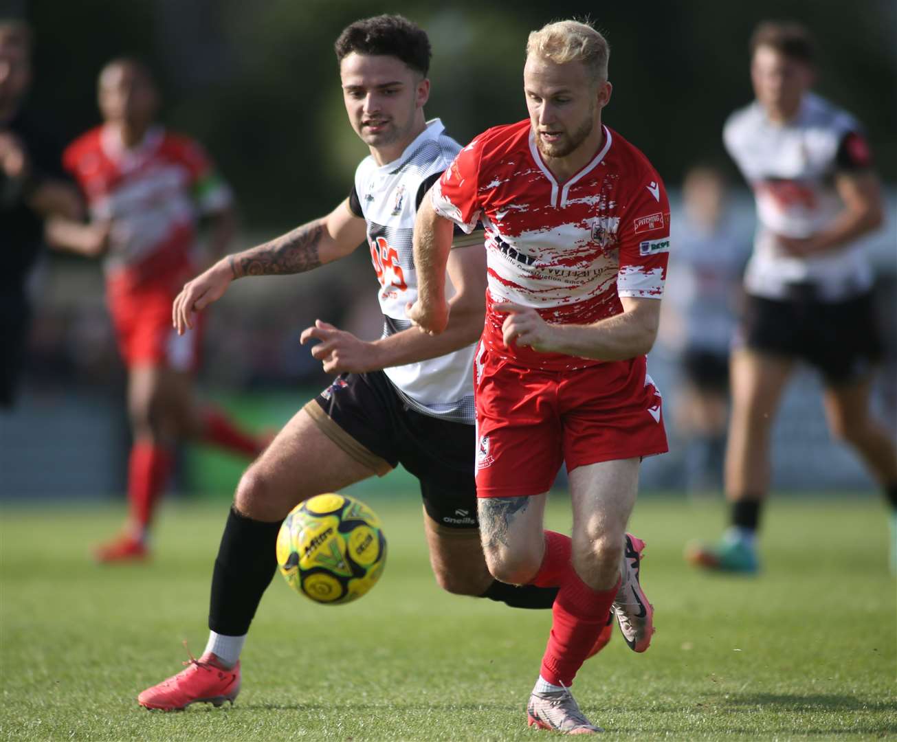 Ramsgate’s Alfie Paxman (red) in the thick of the action at Deal on Monday as they won 4-2. Picture: Paul Willmott