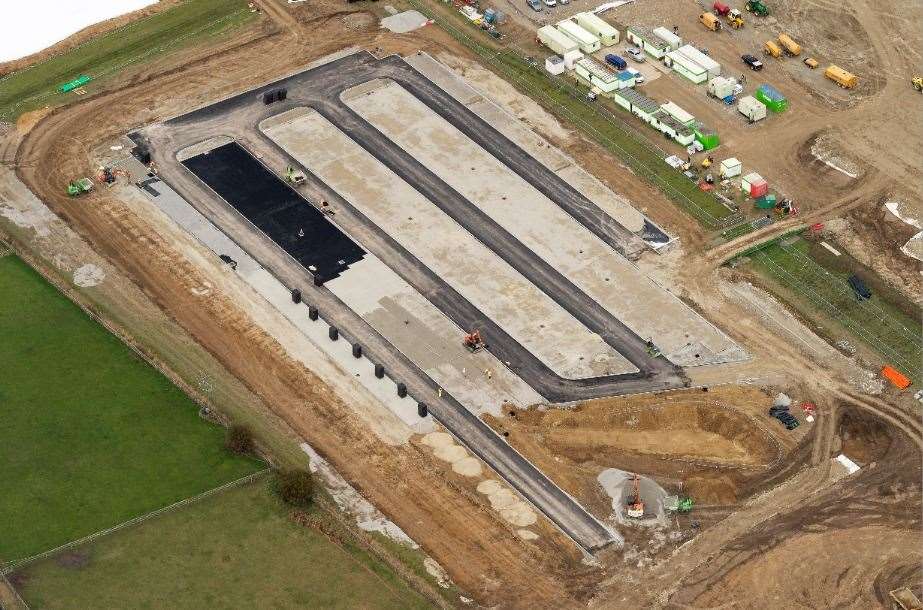 Work started on the site in mid-July just hours after the government took control of the land. Months on, this photo shows what will become the staff car park. The government says employees will include fully trained security personnel, traffic management staff and emergency response personnel. The number of staff needed on the site will be determined as part of the ‘operational management plan’, but bosses say a “number of local jobs” could be created. Picture: Ady Kerry / Ashford Borough Council