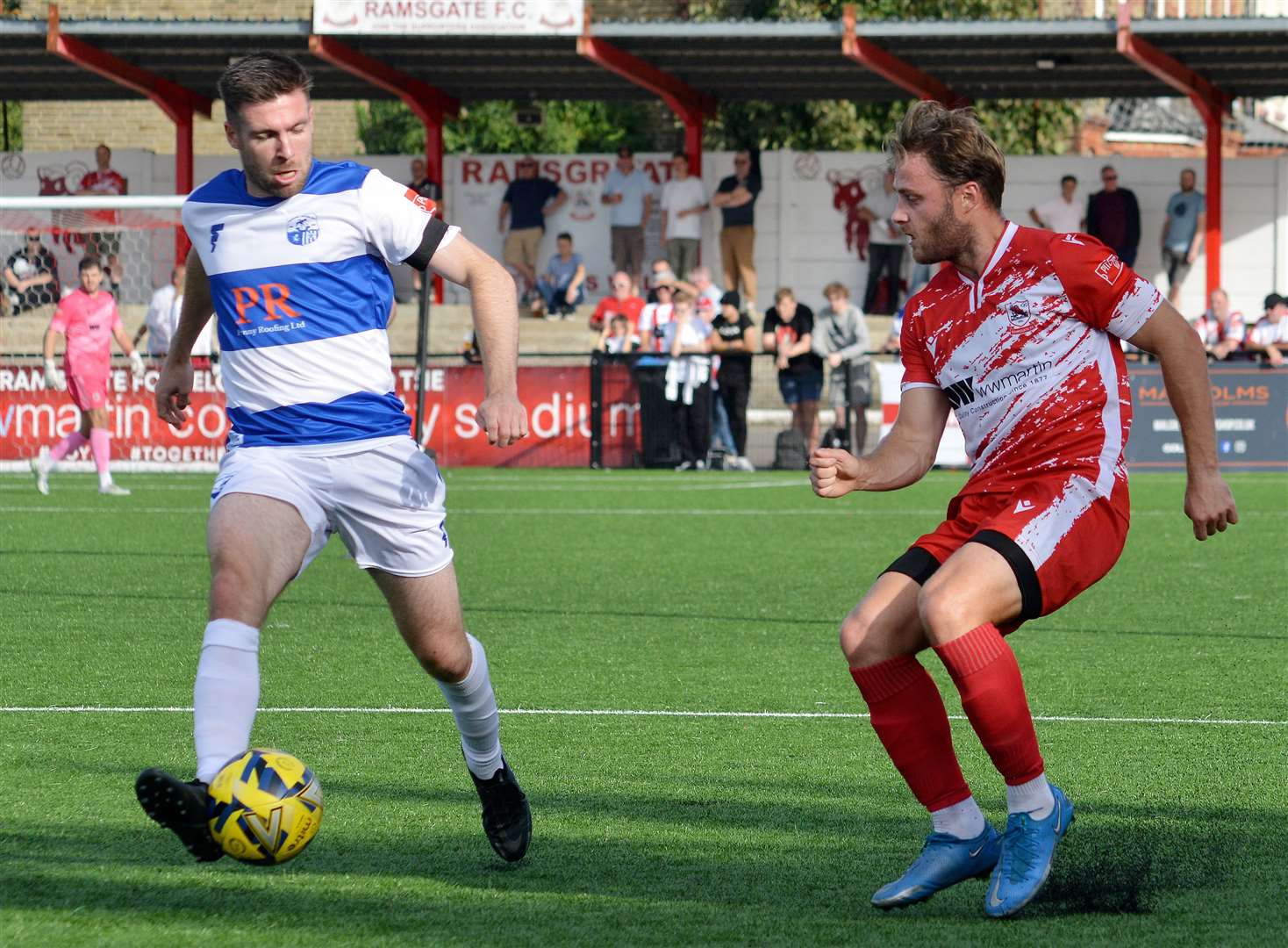 Sheppey's Danny Leonard, left, takes on Ramsgate's Jack Parter in their FA Trophy clash last weekend. Picture: Randolph File