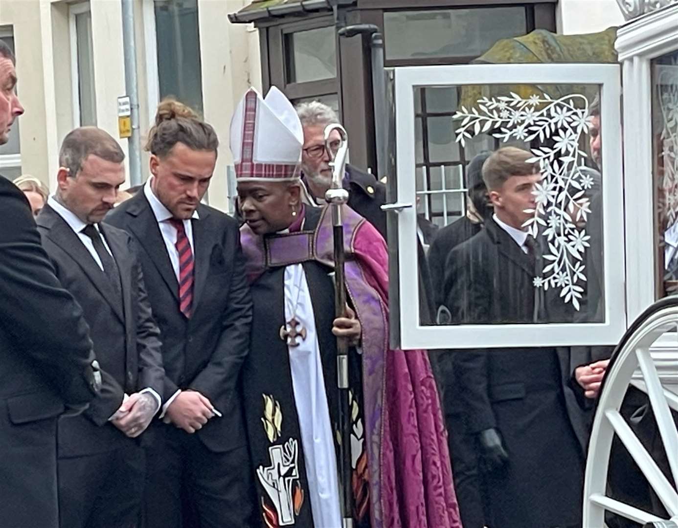 Bishop Rose shares a word with William Brown Sr at the funeral on Saturday, January 13. Picture: Gabriel Morris/KMTV