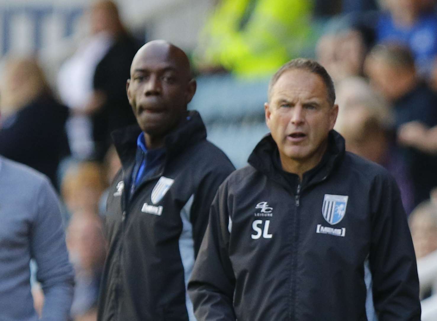 Steve Lovell with former defender Ian Cox on the sidelines at Peterborough Picture: Andy Jones