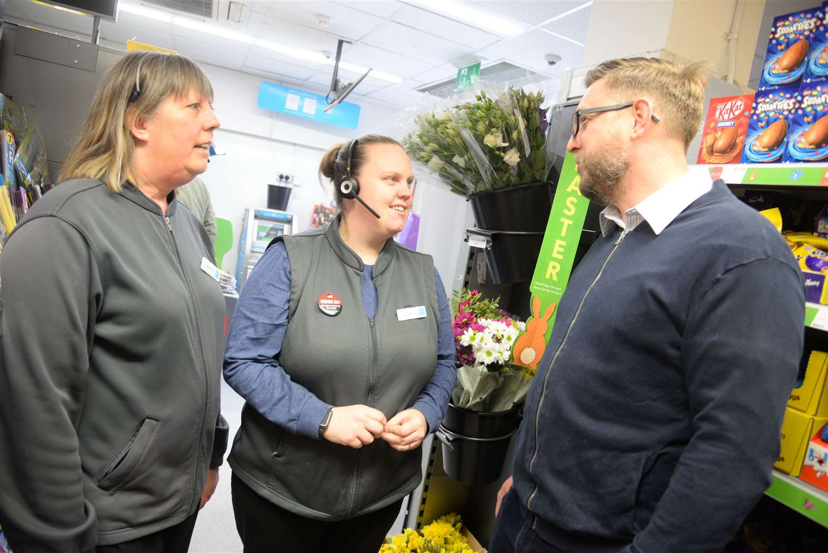 Co-op team member Sharon Trice and manager Laura Charles with Marc Harris who came to the aid of a woman during an armed robbery in the Delce Road Co-op