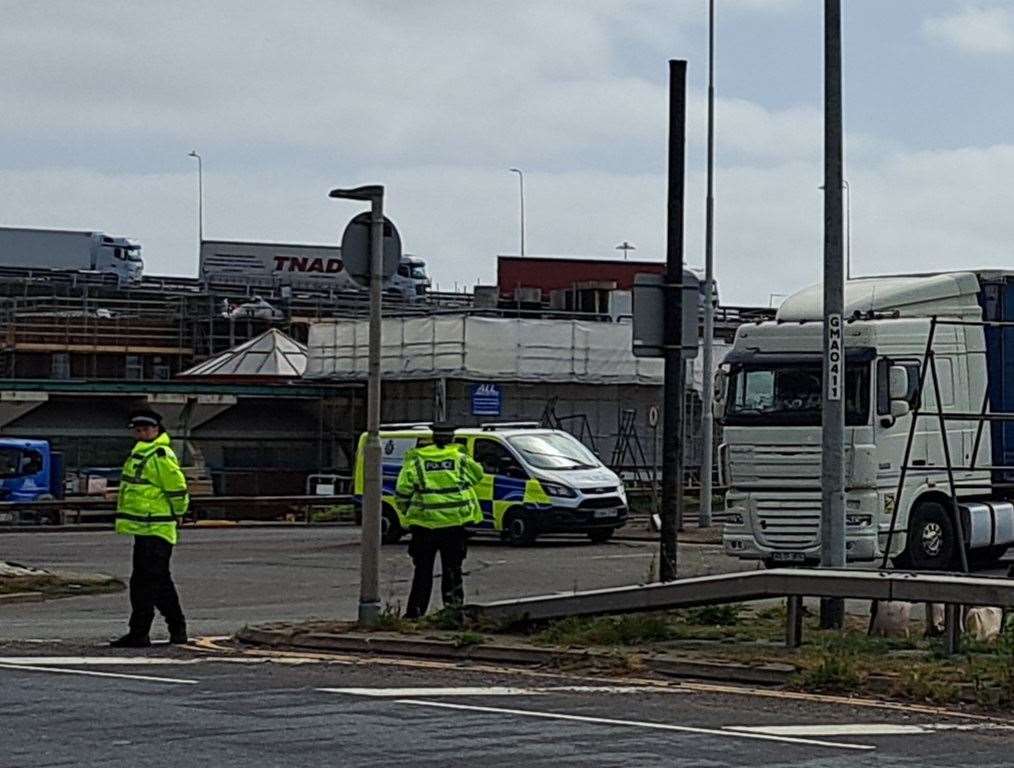 An ambulance is blocked and has to drive on the wrong side of the road on Jubilee Way in Dover to get through port traffic