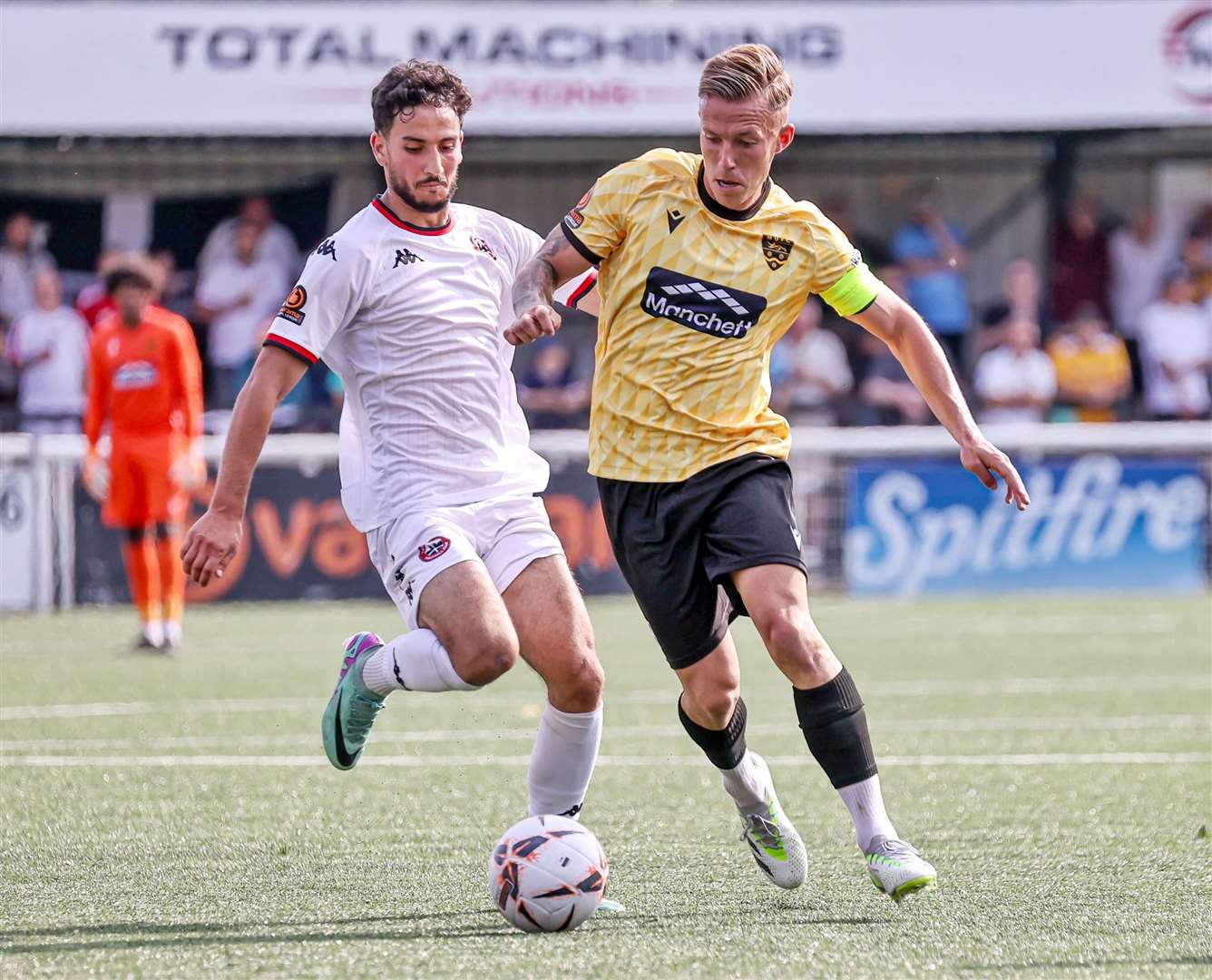 Maidstone captain Sam Corne makes progress in midfield. Picture: Helen Cooper