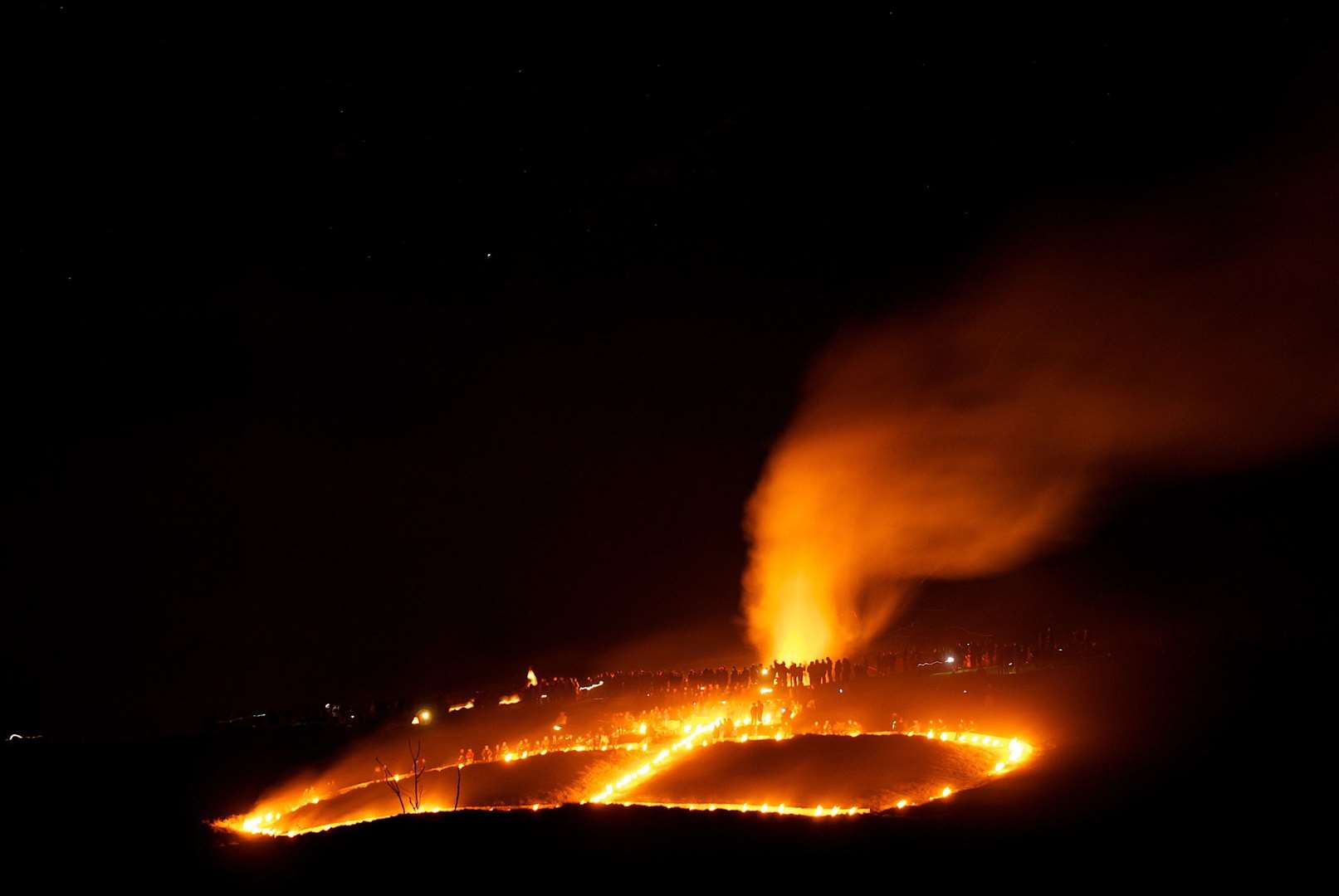 Fireworks over the lit-up Wye Crown on the Wye Downs in November 2010. Picture: Richard Earland