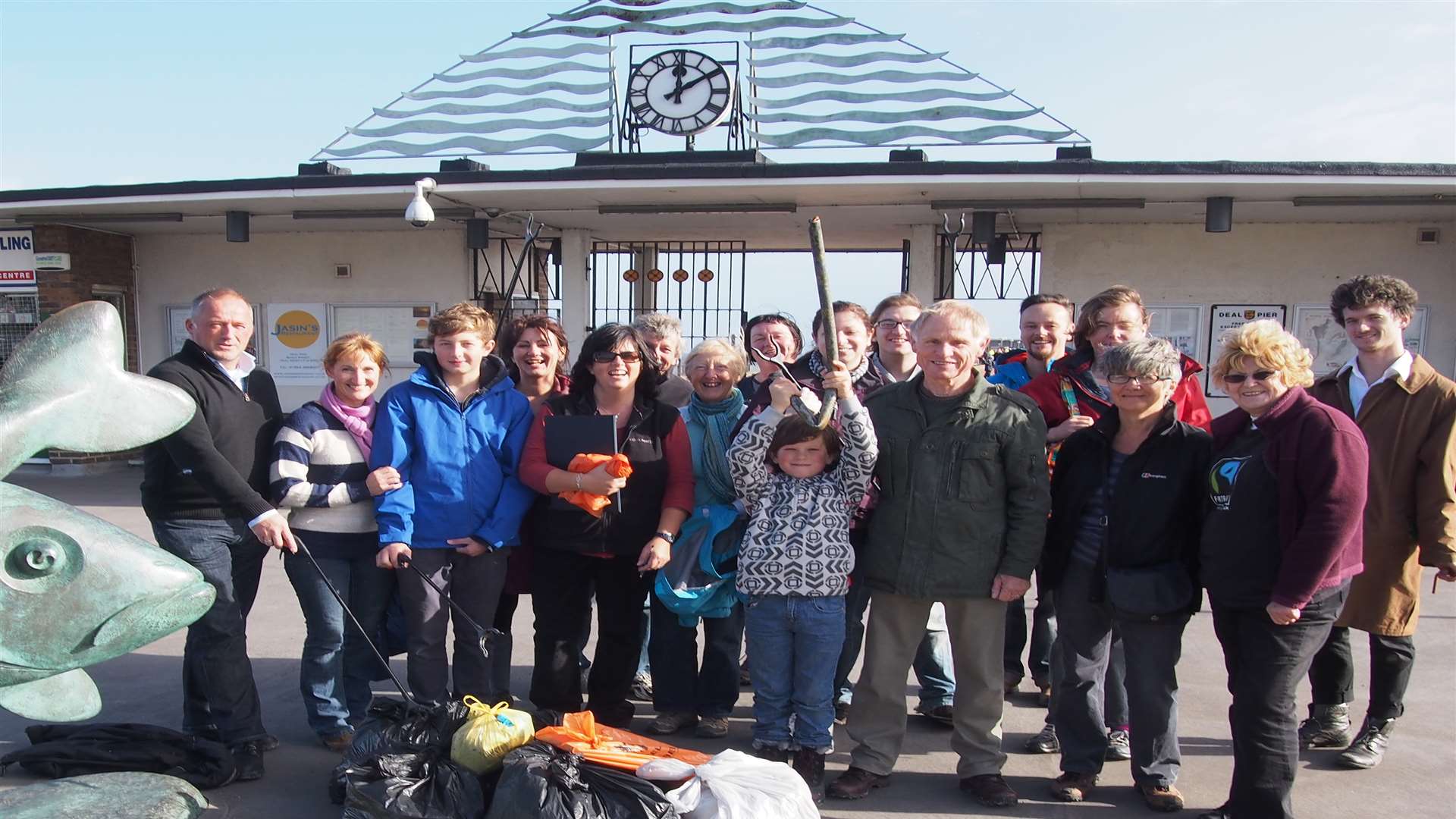 Volunteers taking part in beach clean organised by Deal With It