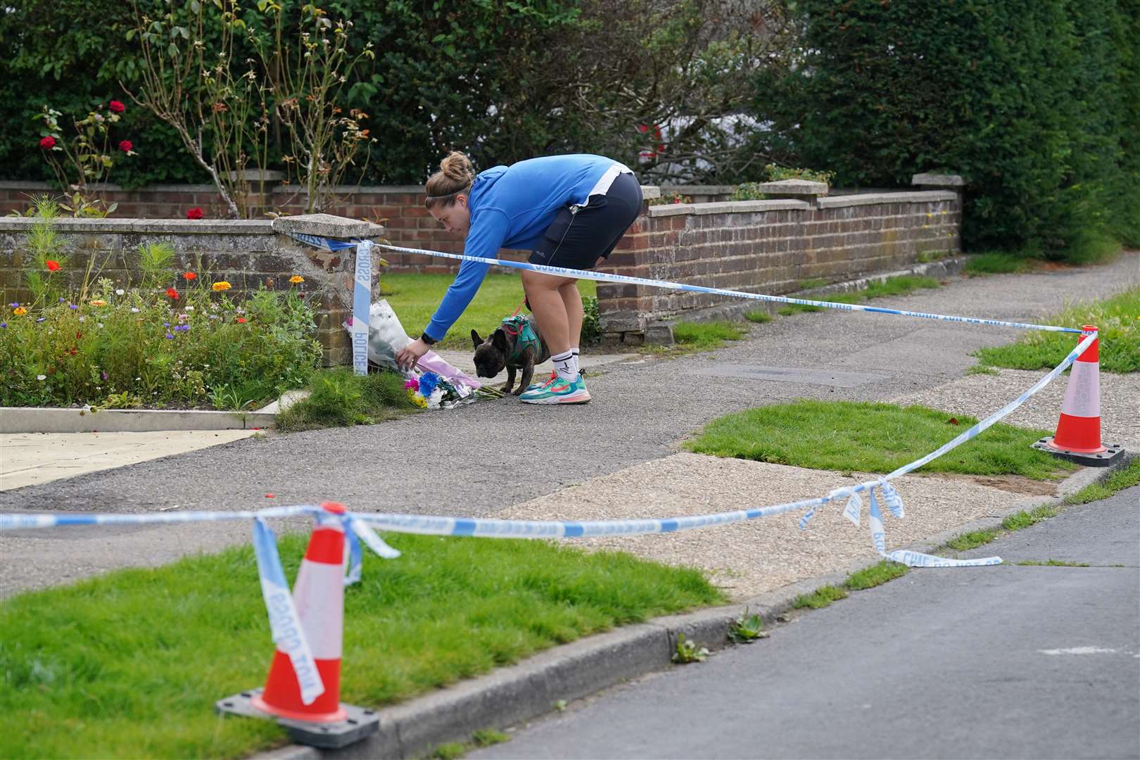 Floral tributes were left outside a property in Hammond Road, Woking, at the time of Sara’s death (Jonathan Brady/PA)