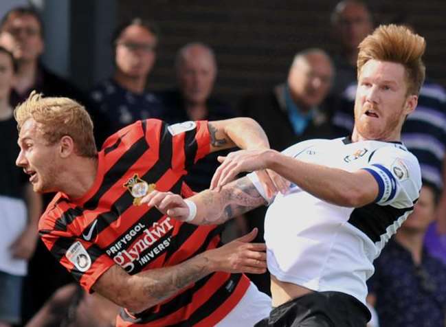 Elliot Bradbrook (right) battles with Wrexham's Blaine Hudson Picture: Richard Eaton