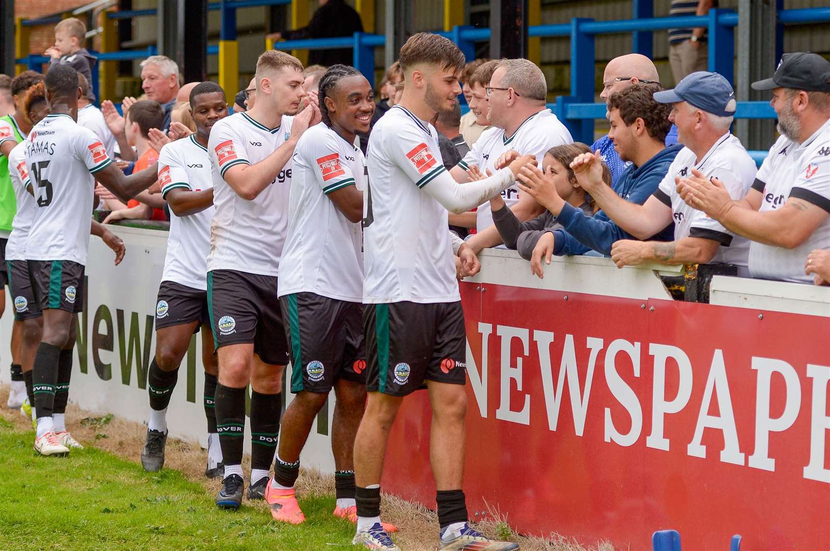 Dover players celebrate their derby win over Dartford with the fans. Picture: Stuart Watson