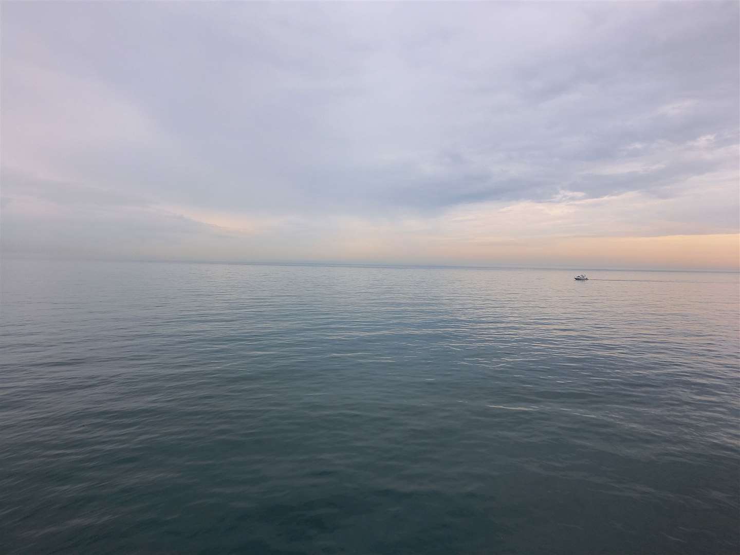 The boat was 1.5 miles away from shore. Stock photo