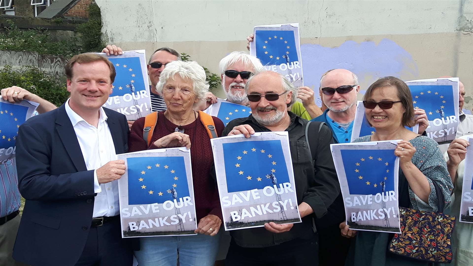 Charlie Elphicke launches his Save our Banksy campaign at the site of the artwork on the corner of Townwall Street and York Street, Dover