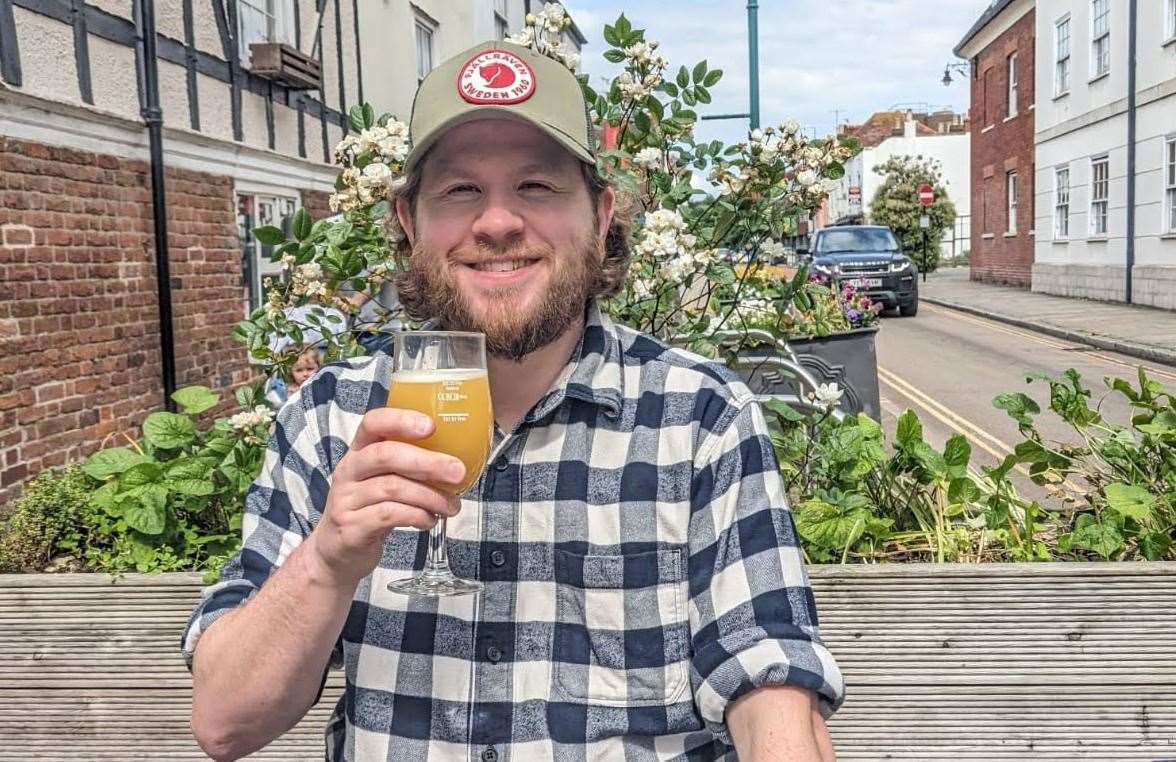 Reporter Rhys Griffiths enjoying a beer at the Thomas Tallis ale house in Canterbury