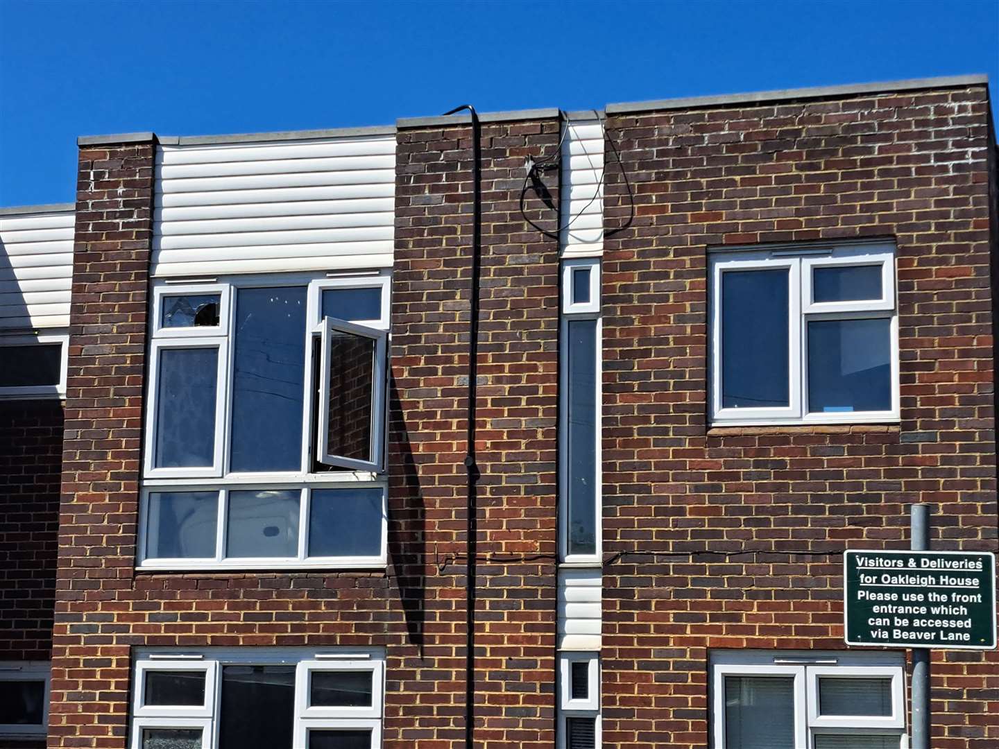 Many windows to the building have been smashed and left open