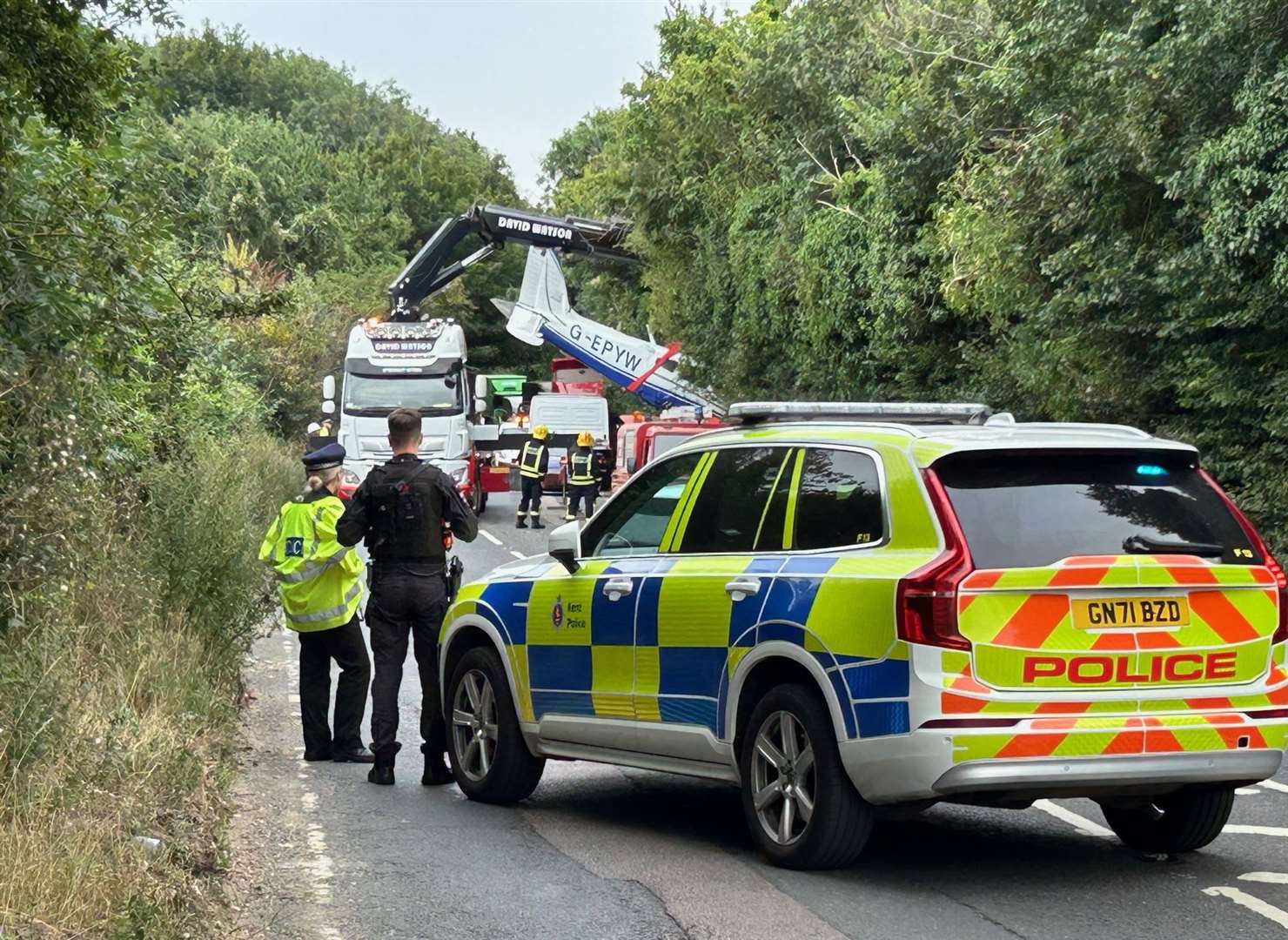 The plane being put onto a recovery vehicle after crash-landing near Rochester Airport