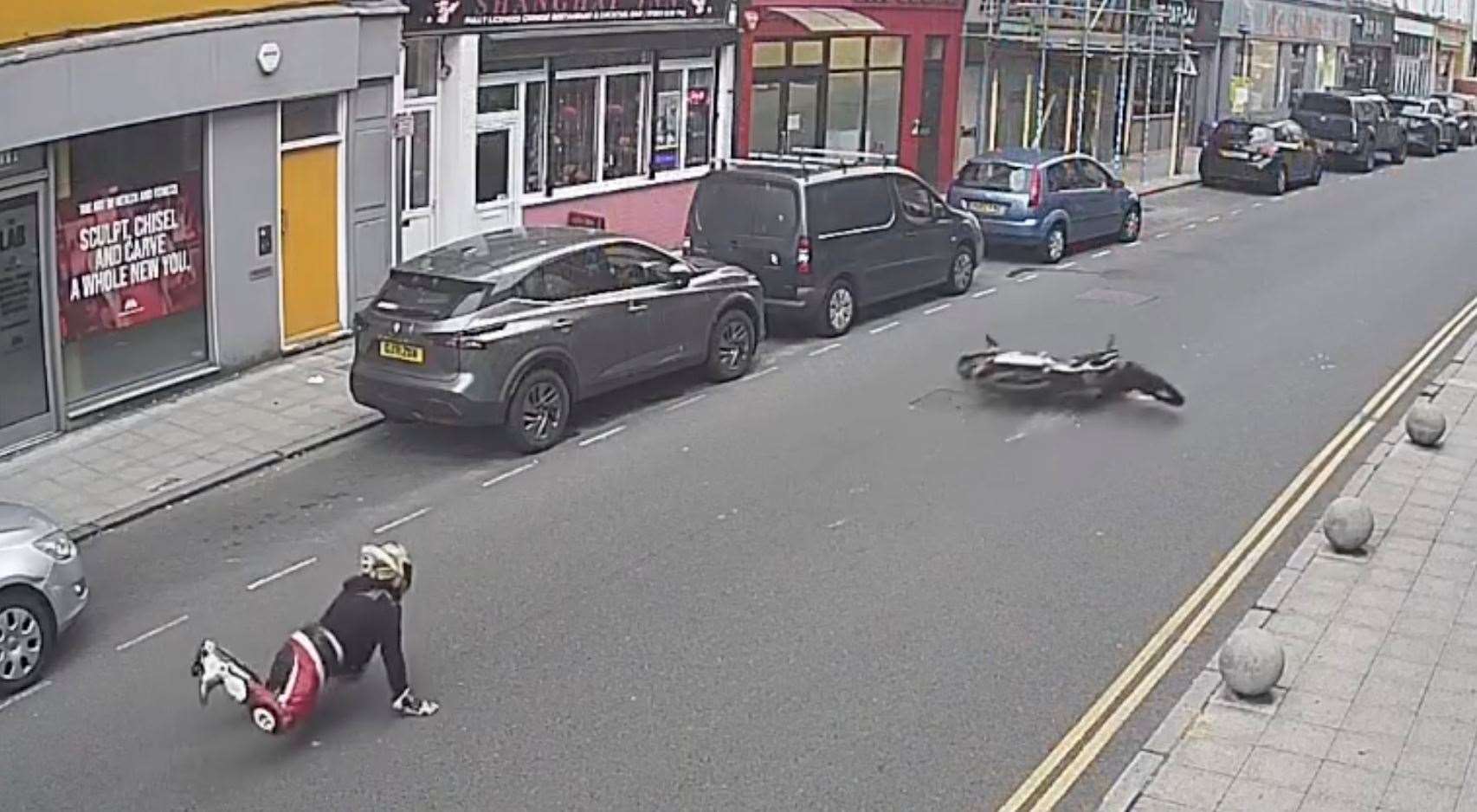 Both the rider and the bike hit the floor following the failed stunt in Tontine Street Folkestone