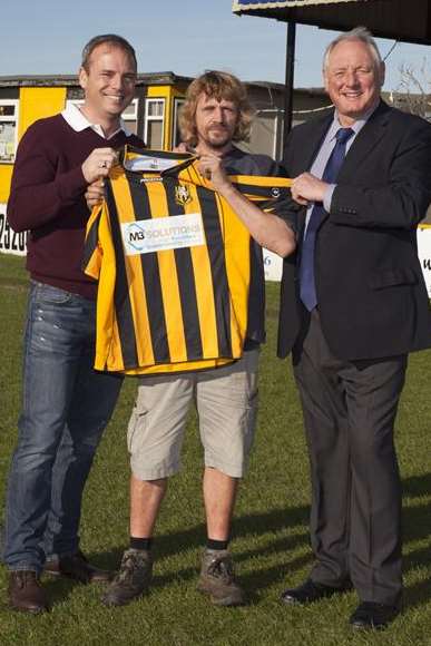 M3 managing director Adrian Williams (left) and Neil Cugley (right) with supporter John Law