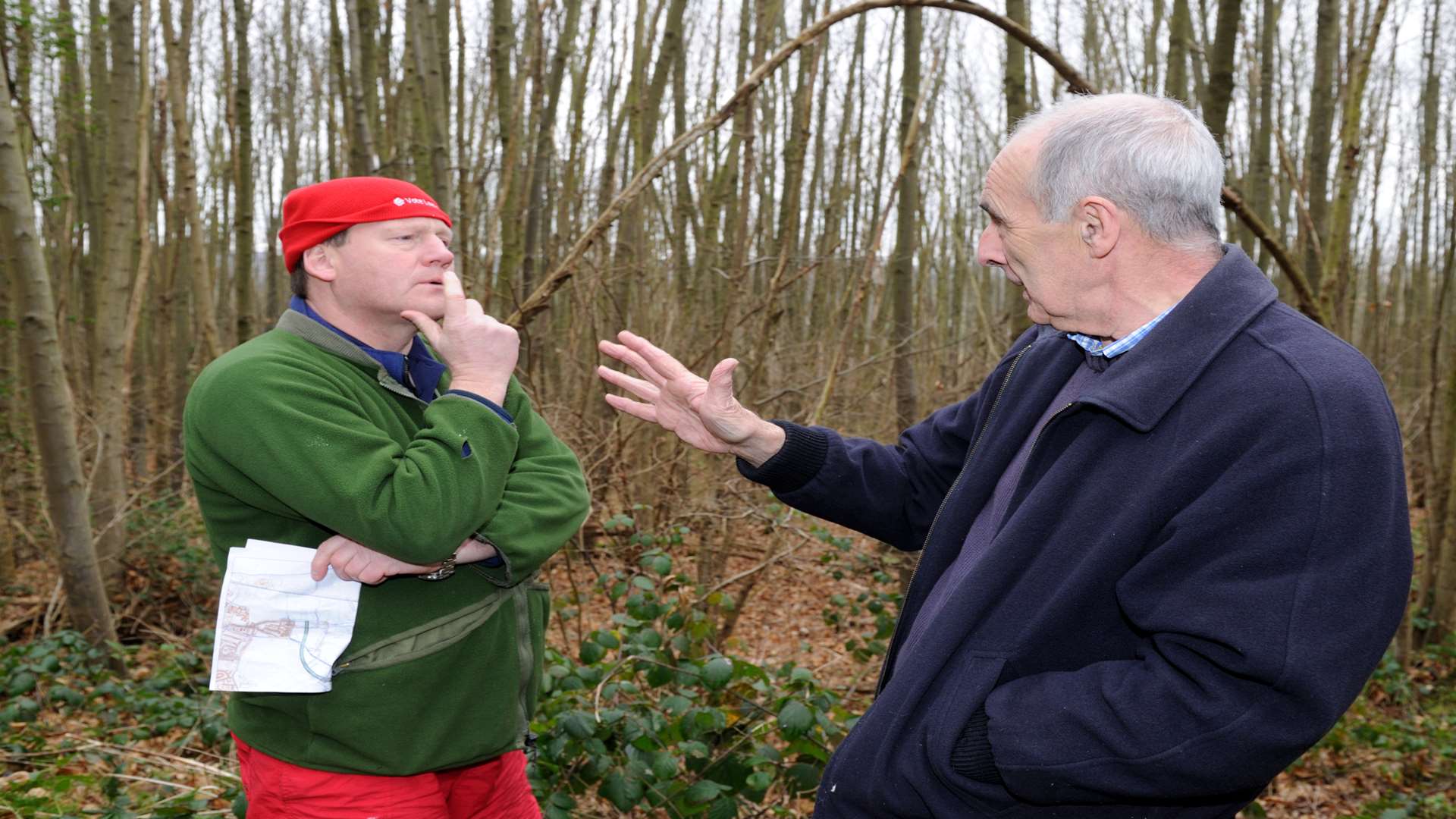 Adam Holloway taking a walk with residents opposed to the site of the new crossing