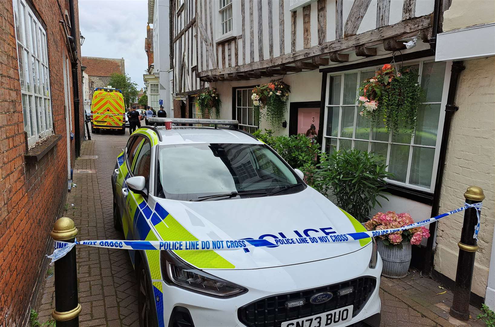 Police have set up cordons following the death of two people in The Butchery, Sandwich