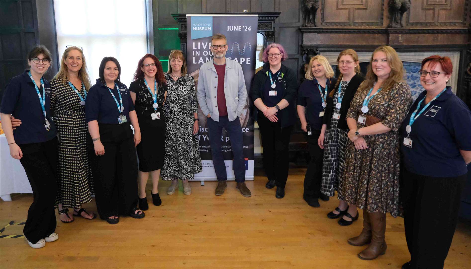 Hugh Dennis with the Maidstone Museum team at the opening of the Lives In Our Landscape Gallery