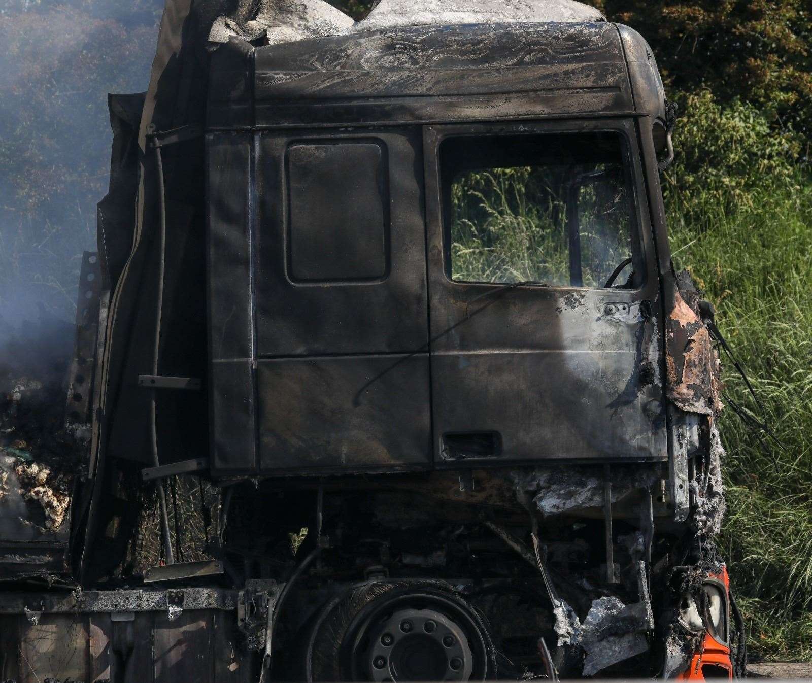 The charred wreckage Picture: UKNIP