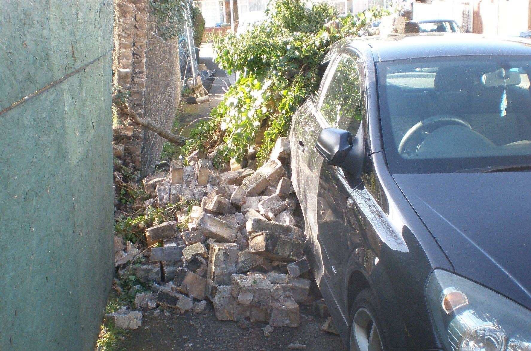 The wall collapsed on the car in Thomas Road, Sittingbourne. Picture: Ian Maggs