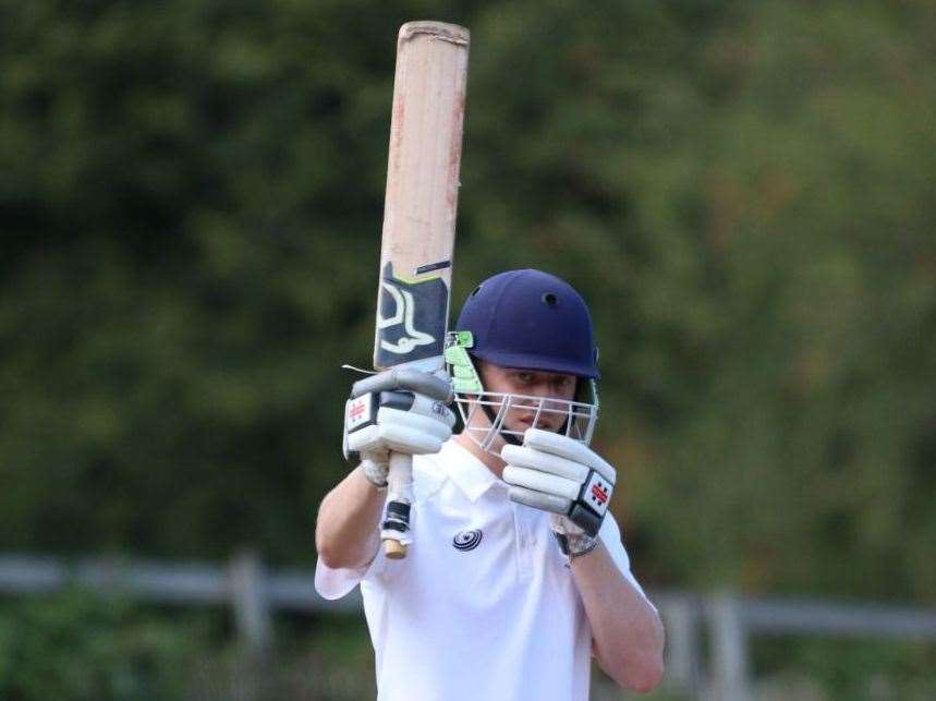 Kieran Savage celebrates his century at Teston on the way to their victory over Sandhurst. Picture: Steve Savage