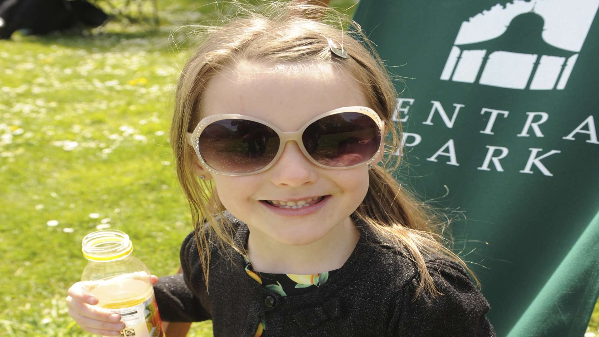 Danni MacDonald, six, enjoys a concert in Central Park